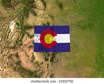 Highlighted Satellite Image Of The State Of Colorado With The State Flag Covering It