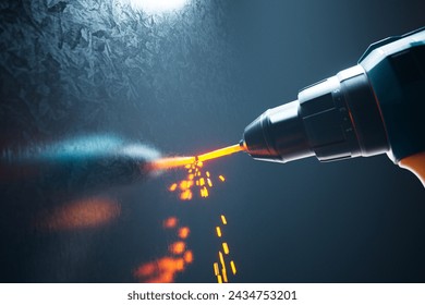 High-powered precision drill bit in action, showcasing advanced industrial machinery as it generates an intense orange glow while penetrating a durable metallic surface.