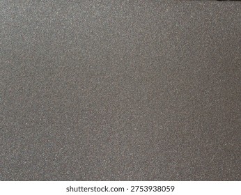 High-resolution dark gray metallic surface texture with a smooth matte finish and fine sparkle for industrial 3D rendering.