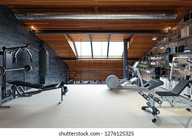 Home Gym Room In The Attic. 3d Rendering Design Concept