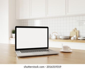 Home Office Workplace In Kitchen, Laptop Laying On Desk Next To Cup Of Coffee. Kitchen Counter In Background. 3D Illustration.