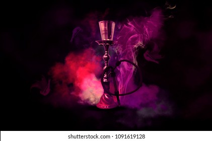 Hookah on a beautiful oriental background, smoke