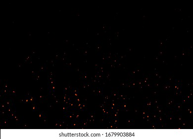 Horizontal Beautiful Burning Hot Sparks Rising from small red Fire in dark Night. Abstract alpha Isolated Fire Glowing Particles on Black Background.Slow Motion. Looped Animation. Moving Side.