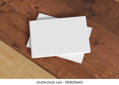 Horizontal Or Landscape White Hardcover Book Stack Mockup On The Wooden Table. 3d Illustration