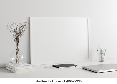 Horizontal Poster Frame Mockup On The White Table Of Home Studio Workspace With White Wall. Side View, Clipping Path Around Poster Picture. 3d Illustration