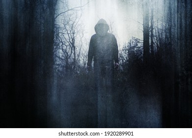 A horror concept of a hooded figure, standing in a forest in winter. With a grunge, artistic, edit