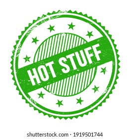 HOT STUFF text written on green grungy zig zag borders round stamp.