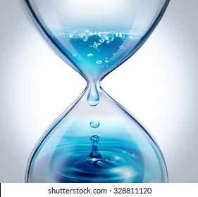 hourglass with dripping water close-up on a light background