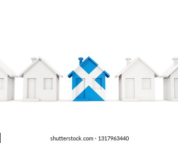 House With Flag Of Scotland In A Row Of White Houses. Real Estate Concept. 3D Illustration