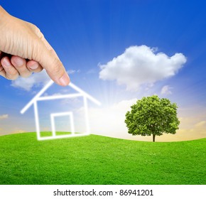 Human Hand Fill Home On The Beautiful Land