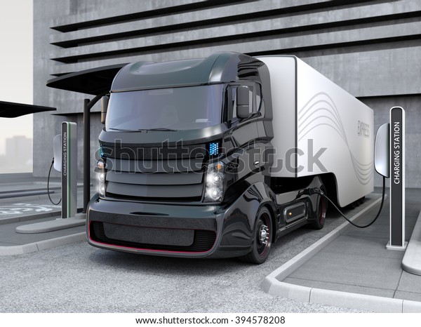 Hybrid\
electric truck being charging at charging\
station