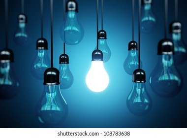 idea concept with light bulbs on a blue background
