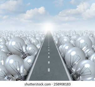 Idea road and creative Path business concept as a street or highway cutting through a landscape of light bulbs as a symbol and metaphor for innovation success and brainstorming solution.