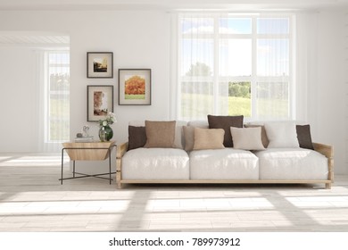 Idea of white room with sofa and summer landscape in window. Scandinavian interior design. 3D illustration - Shutterstock ID 789973912