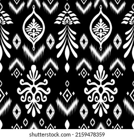 Ikat tribal Indian seamless pattern. Ethnic Aztec fabric carpet mandala ornament native boho chevron textile.Geometric African American oriental tranditional illustrations. Embroidery style