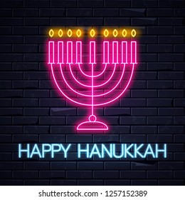 Illuminated Neon Signs Happy Hanukkah Holiday Light Electric Banner Glowing On Black Brickwall. Neons Sign Billboard Design Template With Traditional Jewish Candles Menorah