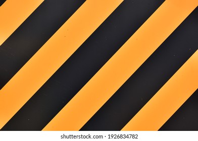 An Illustration With Alternating Yellow And Black Diagonal Lines. Construction Site Barricade Concept.