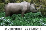 An illustration of a Brontotherium eating a buffet of vegetation. Brontotherium is an extinct group of large herbivores. It was endemic to North America during the Late Eocene epoch.