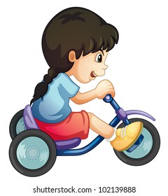 child riding tricycle