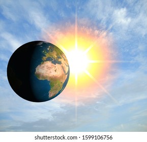 Illustration of the Earth in space among the clouds and in the rays of the sun. 3D model rendering.
