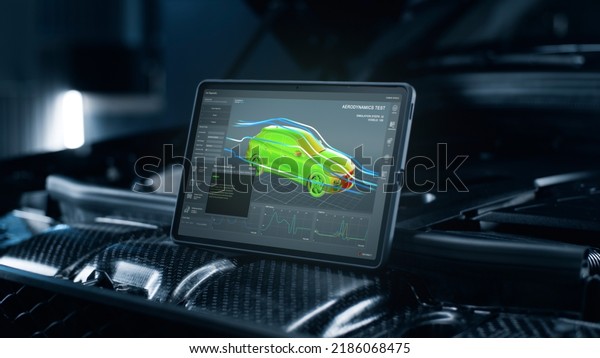 IlLustration of interface application for\
research and testing of the aerodynamic parameters of the car body\
on the screen of a digital tablet computer, that stands on the car\
engine.
