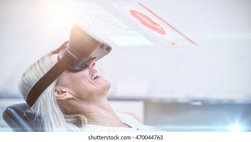 Illustration of line graph against woman using virtual glasses - Powered by Shutterstock