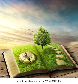 Illustration of magic opened book covered with grass, compass, tree and stoned way on woody floor, balcony. Fantasy world, imaginary view. Book, tree of life, right way concept. Original screensaver. 