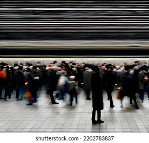 Illustration Of A Man Against The Backdrop Of A Moving Crowd. Crowd On The Subway