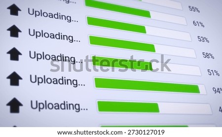 Illustration of the process of uploading multiple files from the Internet on a computer monitor screen. A computer monitor displaying information about the data upload in real time, including percentages.