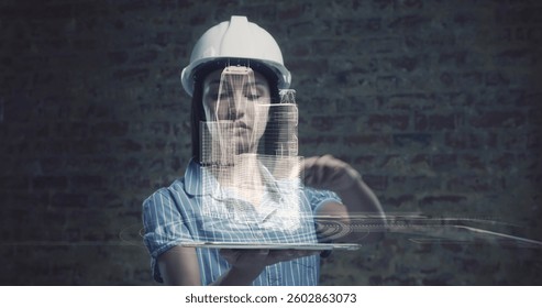 Image of 3d interactive model of city spinning over tablet held by female architect. global industry, architecture and technology concept digitally generated image.