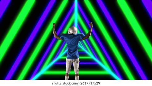 Image of african american male american football player raising hands over shapes. global sport and digital interface concept digitally generated image.
