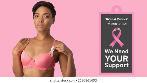 Image of breast cancer awareness text over african american woman on pink background. breast cancer positive awareness campaign concept digitally generated image. - Powered by Shutterstock