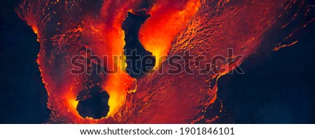 the image of burning lava in abstract form on a dark background	