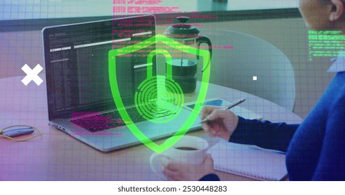 Image of data processing and globe over caucasian businesswoman using laptop. Computer security day and celebration concept digitally generated image.