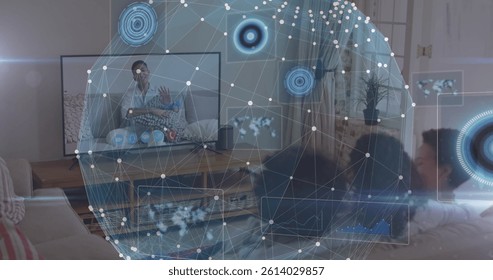 Image of data processing and globe over biracial family having image call on tv. global communication technology concept digitally generated image.