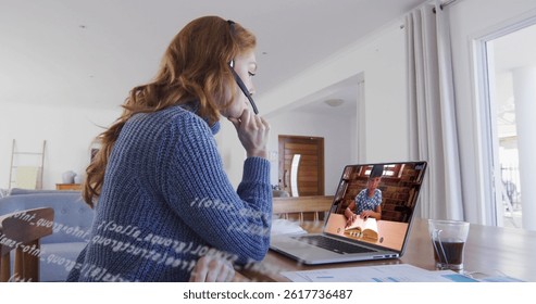 Image of data processing over caucasian woman working from home, having image call. home office and online working with technology concept digitally generated image.