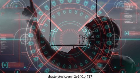 Image of data processing over male american football player pointing finger. sport and celebration concept digitally generated image.