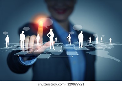 Image of female touching virtual icon of social network - Shutterstock ID 129899921