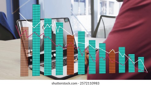 Image of financial data processing over african american man on laptop video call. Global finance, business, connections, computing and data processing concept digitally generated image.