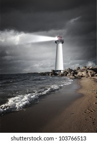Image of a lighthouse with a strong beam of light
