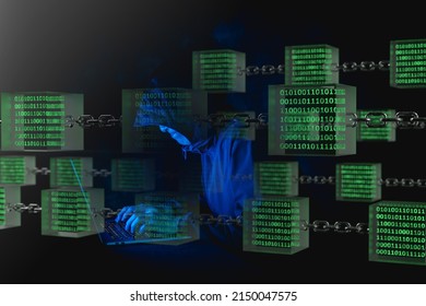 Image Of A Man In A Black Hoodie Pointing To The Screen Of A Laptop Computer At Home And Remotely Controlling It, Under Green Glowing Binary Data In A Glass Cube On Chains. 3D CG. 3D Illustration.