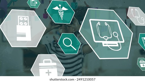 Image of medical icons over caucasian woman using vr headset. Global medicine and digital interface concept digitally generated image. - Powered by Shutterstock