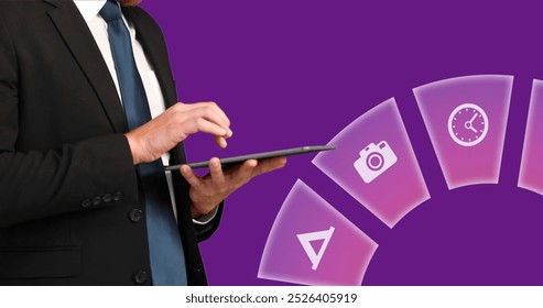 Image of multiple icons over midsection of businessman scrolling on digital tablet. Digital composite, multiple exposure, protection, time, ideas, abstract and technology concept.