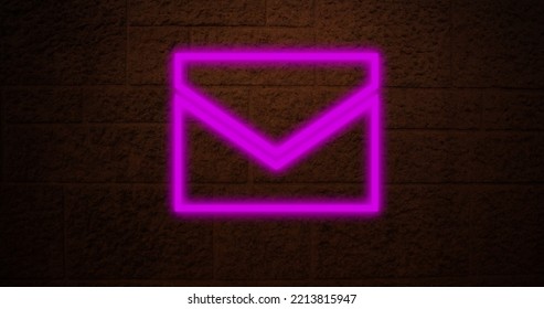 Image Of Neon Email Symbol Over Brick Wall. Social Media, Communication, Advertisement And Neon Concept.