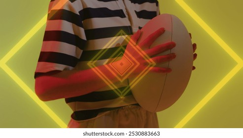 Image of neon lights over female rugby player holding ball. Sports and competition concept digitally generated image. - Powered by Shutterstock