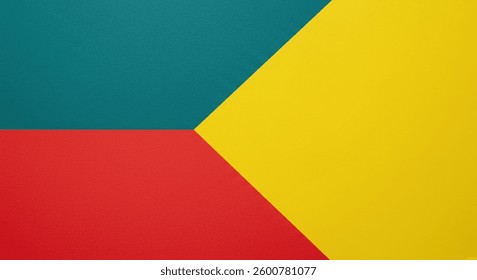 Image shows three vibrant color blocks forming geometric triangles. Teal, red, and yellow hues create a simple yet striking abstract design. Minimalist and modern.