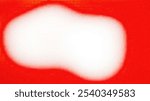 The image shows a white, blurred shape against a red background. The shape is vaguely circular and has a soft, fuzzy edge.