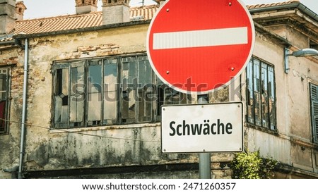 An image with a signpost pointing in two different directions in German. One direction points to strength, the other points to weakness.