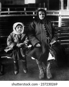 Immigrant mother and daughter, Ellis Island, c.1902.