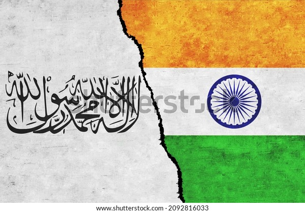 India and Taliban painted flags on a\
wall with a crack. India and Taliban relations. Islamic Emirate of\
Afghanistan and India flags together. India vs\
Taliban